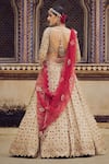 Shop_Nitika Gujral_Gold Tissue Embroidery Dori Sweetheart Neck Stone Bridal Lehenga Set _at_Aza_Fashions