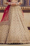 Nitika Gujral_Gold Tissue Embroidery Dori Sweetheart Neck Stone Bridal Lehenga Set _Online_at_Aza_Fashions