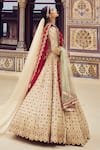 Nitika Gujral_Gold Tissue Embroidery Dori Sweetheart Neck Stone Bridal Lehenga Set _at_Aza_Fashions