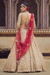 Shop_Nitika Gujral_Gold Tissue Embroidery Dori Sweetheart Neck Stone Bridal Lehenga Set _at_Aza_Fashions