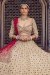 Buy_Nitika Gujral_Gold Tissue Embroidery Dori Sweetheart Neck Stone Bridal Lehenga Set 