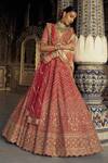 Buy_Nitika Gujral_Red Raw Silk Embroidered Dori Plunge Chevron Vine Dabka Bridal Lehenga Set _at_Aza_Fashions