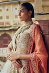 Nitika Gujral_Gold Raw Silk Embroidered Dori 3d Sequin Scallop Embellished Bridal Lehenga Set _at_Aza_Fashions