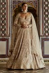 Buy_Nitika Gujral_Gold Satin Embroidered Dabka Sweetheart Rosette Vine Zari Bridal Lehenga Set _at_Aza_Fashions