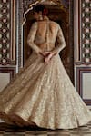 Shop_Nitika Gujral_Gold Satin Embroidered Dabka Sweetheart Rosette Vine Zari Bridal Lehenga Set _at_Aza_Fashions