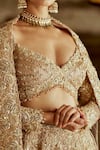 Nitika Gujral_Gold Satin Embroidered Dabka Sweetheart Rosette Vine Zari Bridal Lehenga Set _Online_at_Aza_Fashions