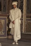 Buy_Nitika Gujral_Ivory Raw Silk Embroidered Thread Flora Sherwani And Choga Set _at_Aza_Fashions