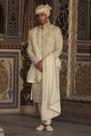 Buy_Nitika Gujral_Ivory Raw Silk Embroidered Thread Flowery Sherwani And Choga Set _at_Aza_Fashions