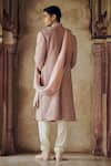 Shop_Nitika Gujral_Pink Raw Silk Embroidered Dori Abstract Pattern Sherwani And Kurta Set _at_Aza_Fashions