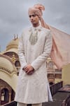 Buy_Nitika Gujral_White Raw Silk Embroidered Gold Zari Sherwani Set _Online_at_Aza_Fashions