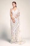 Seema Gujral_Grey Net Embroidered Sequins Plunged Sweetheart Saree With Blouse _at_Aza_Fashions