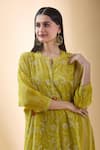 SHRADDHA RAMBHIA_Yellow Chanderi Embroidered Thread Mandarin Collar Floral Kurta _at_Aza_Fashions