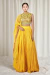 Buy_Debyani + Co_Yellow Embroidered Floral High Neck Sequin Blouse Lehenga Set _at_Aza_Fashions