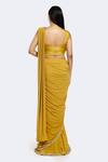 Shop_Onaya_Yellow Lycra Net Embellished Cutdana Attached Sash Pre-draped Saree With Blouse _at_Aza_Fashions