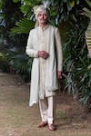 Buy_Philocaly_Green Embroidered Fabric Textured Gold Accents Heer Sherwani And Kurta Set _at_Aza_Fashions