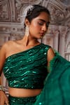 Nidhika Shekhar_Green Organza Embellished Abstract Asymmetric Neck Aphrodite Lehenga Set _at_Aza_Fashions