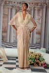 Nidhika Shekhar_Beige Shimmer Embroidery Linear V Neck Aphrodite Cape Gown _Online_at_Aza_Fashions