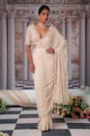 Buy_Nidhika Shekhar_Beige Foil Georgette Embroidery Super Aphrodite Pre-draped Saree With Blouse _at_Aza_Fashions