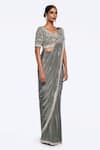Shop_Onaya_Green Crepe Cut Work, Stripe Embellished Pre-stitched Saree With Blouse _Online_at_Aza_Fashions