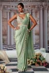 Nidhika Shekhar_Green Zari Georgette Embroidery Divine Placement Pre-draped Saree And Blouse Set _Online_at_Aza_Fashions