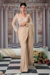 Buy_Nidhika Shekhar_Gold Foil Georgette Embroidery Sequins Celestial Pre-draped Saree With Blouse _at_Aza_Fashions