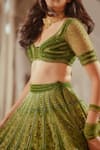 Buy_TUHINA SRIVASTAVA_Green Silk Velvet Embroidered Stone Leaf Floral Lehenga Set _Online_at_Aza_Fashions