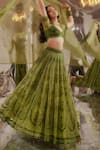 TUHINA SRIVASTAVA_Green Silk Velvet Embroidered Stone Leaf Floral Lehenga Set _at_Aza_Fashions