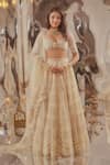 Buy_TUHINA SRIVASTAVA_Off White Silk Velvet Embroidered Glass Bead Sweetheart Lehenga Blouse Set _at_Aza_Fashions