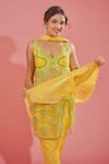 Shop_TUHINA SRIVASTAVA_Yellow Tulle Embroidery Floral Swirl Neck Flower Bloom Kurta Pant Set _Online_at_Aza_Fashions