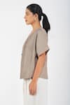 Diva by Sangeeta Ranka_Brown Irish Linen Plain V Neck Pintuck Asymmetric Shirt _Online_at_Aza_Fashions