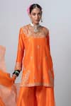 Buy_Pants and Pajamas_Orange Embroidery Floral Round Neck Flower Kurta Sharara Set _Online_at_Aza_Fashions