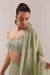 Shop_Silky Bindra_Green Organza Embellished Crystal Scoop Kaena Lehenga Set _at_Aza_Fashions