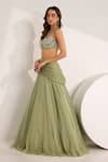 Silky Bindra_Green Shimmer Chiffon Embellished Crystal Kiara Lehenga Set With Bralette _at_Aza_Fashions