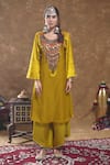 Buy_Ekavira_Yellow Silk Embroidery Tribal Coins Round Neck Shaira Kurta And Palazzo Set _at_Aza_Fashions