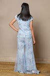 Shop_Kirti Agarwal - Pret N Couture_Blue Net Embroidery Bead Floral Jacket Flared Pant Set _at_Aza_Fashions