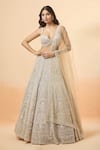 Buy_Seema Gujral_Peach Net Embroidered Floral Art Sweetheart Bridal Lehenga Set _at_Aza_Fashions