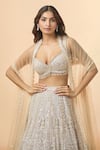 Seema Gujral_Peach Net Embroidered Floral Art Sweetheart Bridal Lehenga Set _at_Aza_Fashions