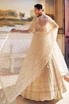 Seema Gujral_Ivory Organza Embroidery Pearl Cutwork V Neck Bridal Lehenga Set _at_Aza_Fashions