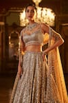 Seema Gujral_Gold Net Embroidery Sequin Sweetheart Neck Geometric Bridal Lehenga Set _Online_at_Aza_Fashions