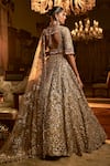 Seema Gujral_Gold Net Embroidery Zardozi Sweetheart Neck Floral Cutwork Bridal Lehenga Set _Online_at_Aza_Fashions