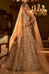 Seema Gujral_Gold Net Embroidery Zardozi Sweetheart Neck Floral Cutwork Bridal Lehenga Set _at_Aza_Fashions