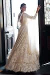 Shop_Seema Gujral_Ivory Net Embroidery Pearl Sweetheart Neck Longline Jacket Lehenga Set _at_Aza_Fashions