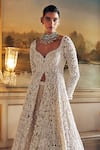 Seema Gujral_Ivory Net Embroidery Pearl Sweetheart Neck Longline Jacket Lehenga Set _Online_at_Aza_Fashions