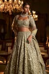 Buy_Seema Gujral_Green Net Embroidery Sequin Cutwork Neck Flower Bridal Lehenga Set _Online_at_Aza_Fashions