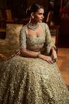 Shop_Seema Gujral_Green Net Embroidery Sequin Cutwork Neck Flower Bridal Lehenga Set _at_Aza_Fashions