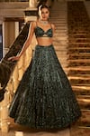 Buy_Seema Gujral_Emerald Green Net Embroidery Sequin Sweetheart Neck Stripe Bridal Lehenga Set _at_Aza_Fashions