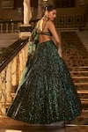 Seema Gujral_Emerald Green Net Embroidery Sequin Sweetheart Neck Stripe Bridal Lehenga Set _Online_at_Aza_Fashions