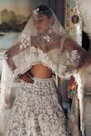 Seema Gujral_Ivory Lehenga And Blouse Raw Silk Embroidery Pearl Cutwork Bridal Set _at_Aza_Fashions