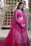 Buy_Isa By Dolly Wahal_Pink Net Embellished Bead Sweetheart Crystal Bridal Lehenga Set _at_Aza_Fashions