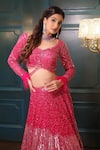 Buy_Isa By Dolly Wahal_Pink Net Embellished Bead Sweetheart Crystal Bridal Lehenga Set _Online_at_Aza_Fashions